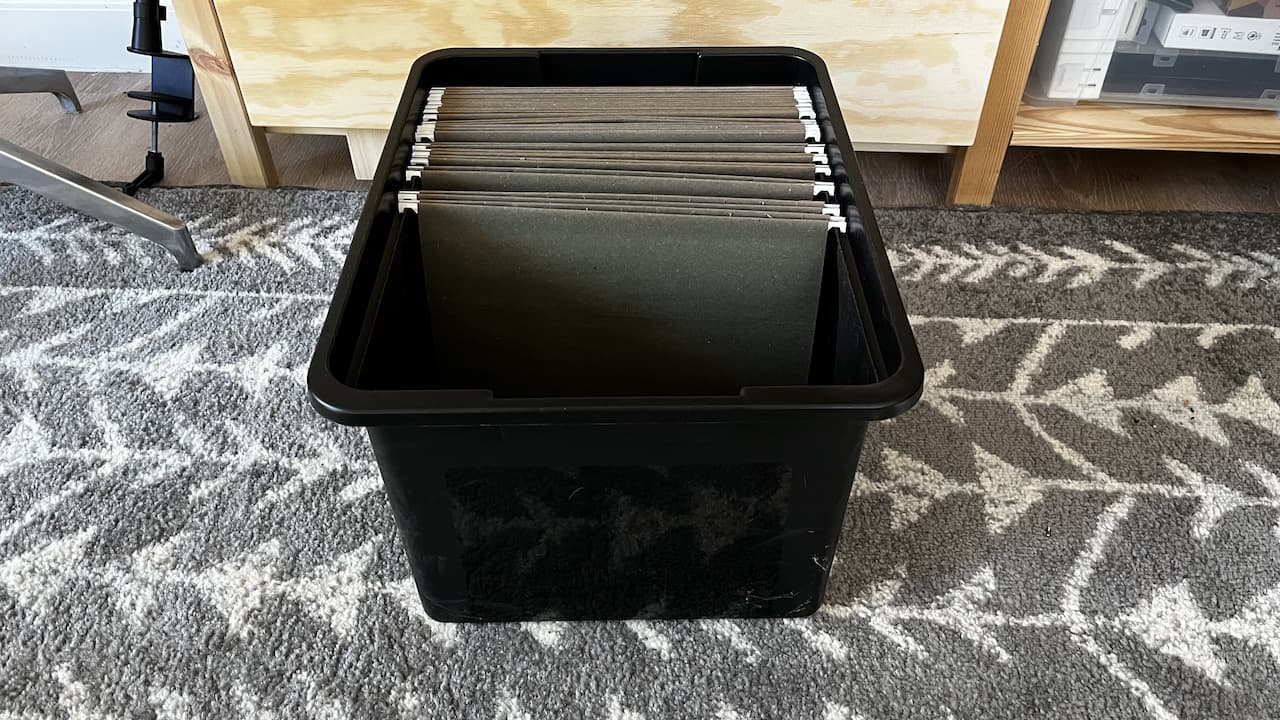 A file folder box filled with empty file folders
