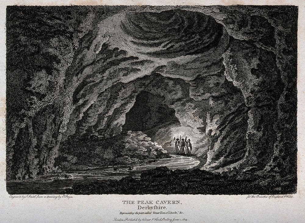 vintage illustration of three explorers in a cave holding torches to light their way