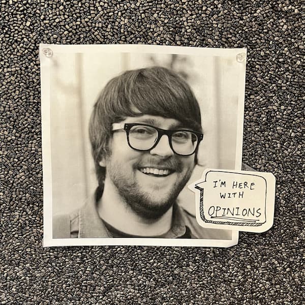 A printout of my avatar with a speech bubble that says I'm here with opinions