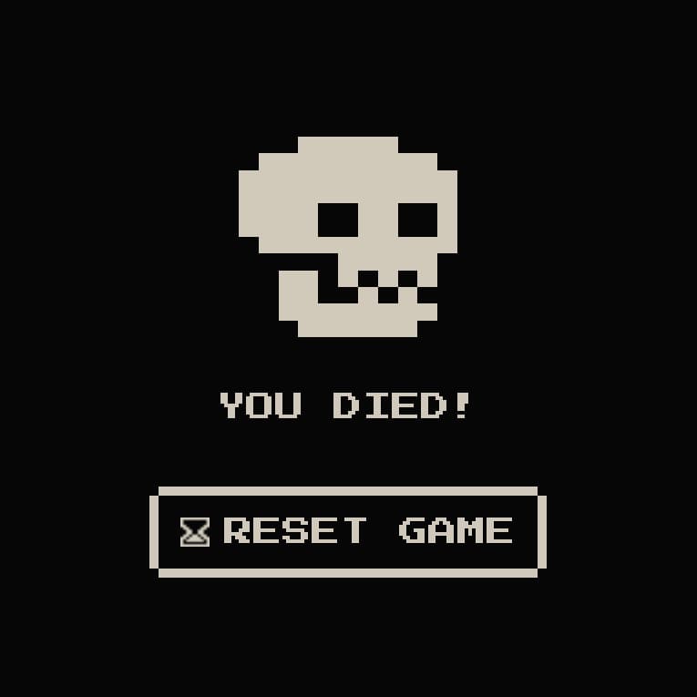 a skull with the text you died beneath it and a button that says reset game