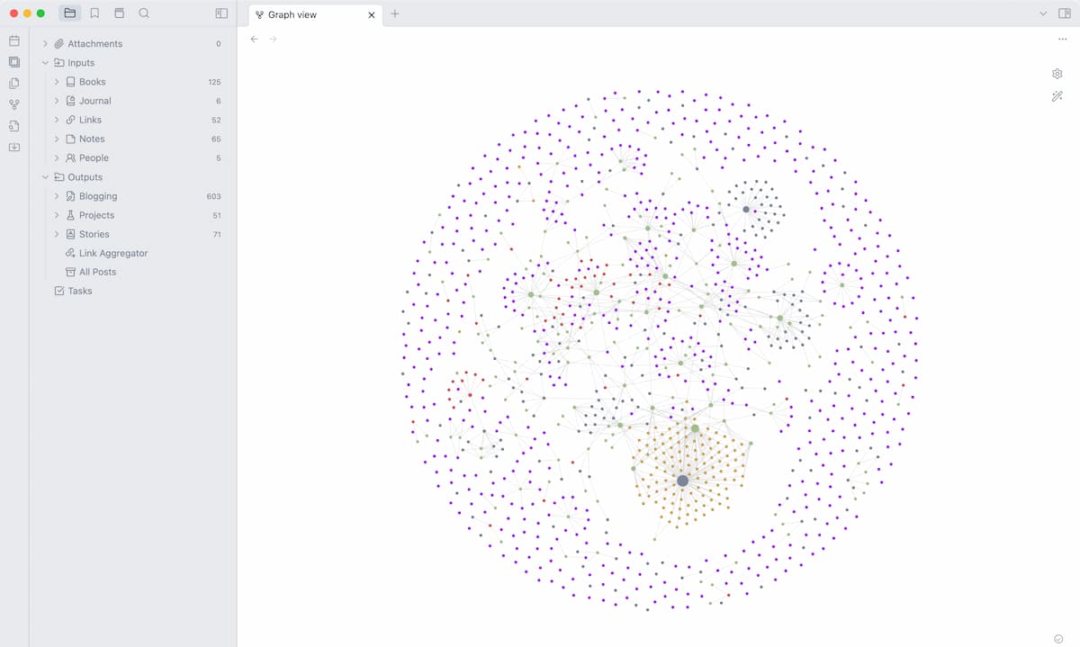 screenshot of my obsidian setup showing a file tree on the left sidebar and a circular graph view of interconnected nodes in the main content area
