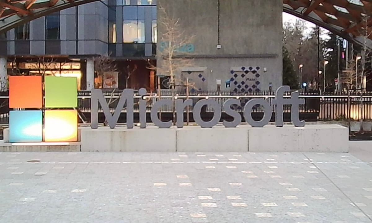 a large outdoor sign of the microsoft logo on the microsoft campus